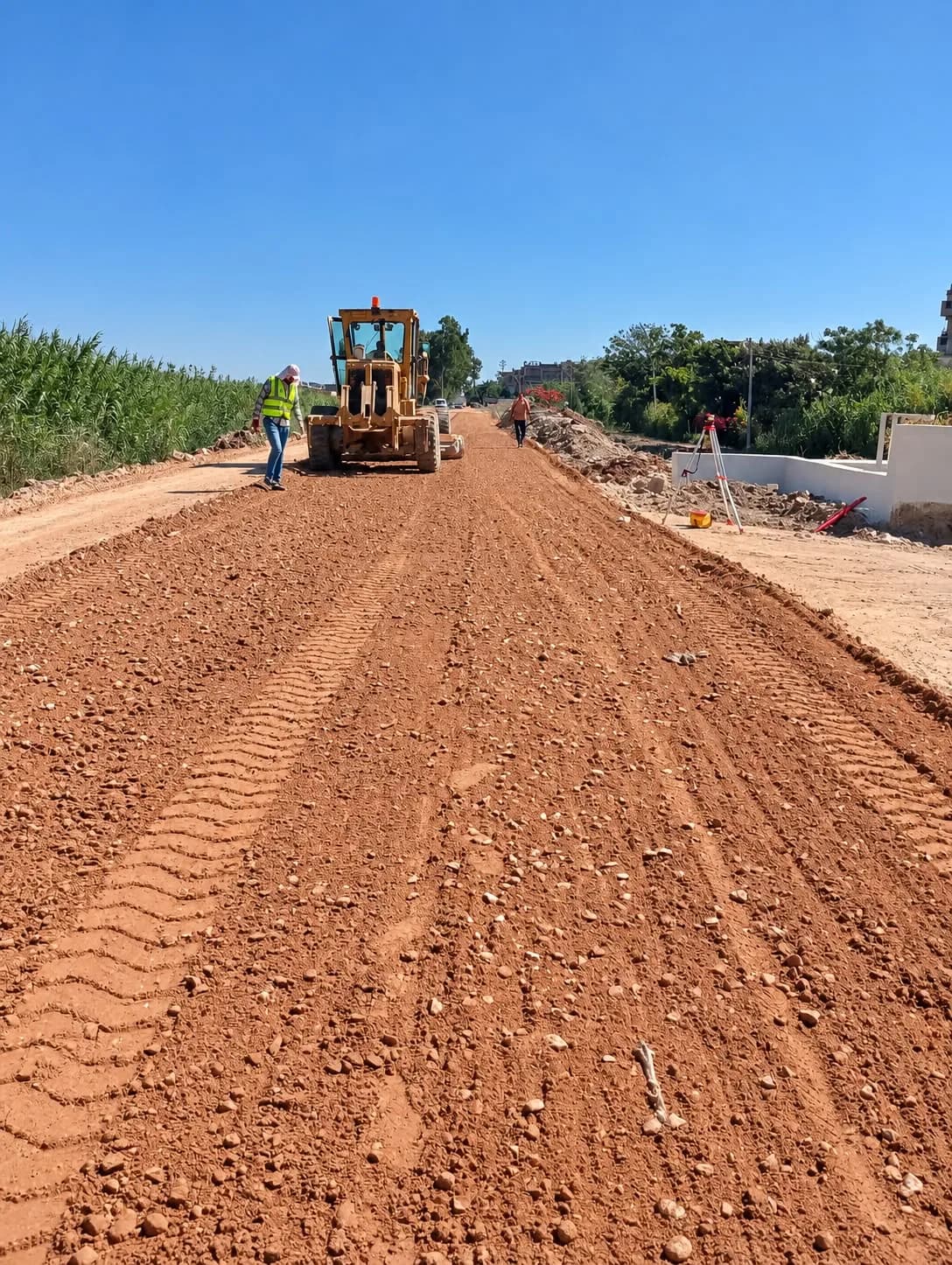 Grading under survey control