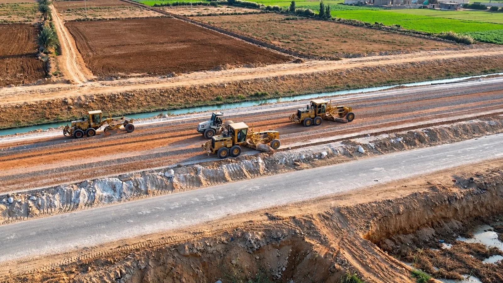 Graders preparing the subgrade